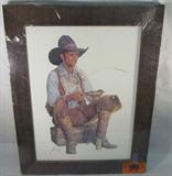 Art 1981 Print "Baked Beans & Beer" G. Snidow
A professionally framed print titled "Baked Beans & Beer" by artist Gordon Snidow. This 1981 Adolph Coors Company print features a rugged cowboy eating from a tin plate with a can of Coors beer at his feet. Measures 24.5" x 19.5".
From the internet: "Gordon Snidow has been known as the foremost chronicler of the contemporary cowboy since 1959 when he graduated with a bachelor’s degree from the Art Center College of Design. At that time, he started his professional career. He is a leader in the development of the American Western Art Movement. He is a historian who records his time in pictures rather than words. He was a Charter and Emeritus member of the Cowboy Artists of America. In 1988, when he took Emeritus membership he had won twenty-seven gold and silver medals, a Colt award, and three Best of Shows in CAA competition."
Z14