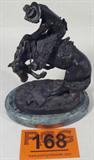 Art Bronze Statue "Rattlesnake" Frederic Remington
A beautiful bronze sculpture titled "Rattlesnake" signed by Frederic Remington. The intricately detailed sculpture features a cowboy on a bucking horse which has been frightened by a snake. Sculpture sits on an oval marble base. Measures 7.5" tall and 6" across.
From the internet: "Frederic Sackrider Remington (October 4, 1861 – December 26, 1909) was an American painter, illustrator, sculptor, and writer who specialized in depictions of the Old American West, specifically concentrating on the last quarter of the 19th century American West and images of cowboys, American Indians, and the U. S. Cavalry."
ZB4623