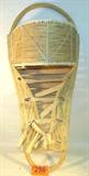 Native American Indian Cradle / Papoose Board
A vintage Native American Indian cradle or papoose board which appears to be handmade. Material is decorated with red, white and black beads. Heavily soiled but wood appears to be in good condition. Measures 34" tall x 14" wide x 12" in depth.
Z14