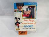 Disney Marionette String Puppet "Goofy"
An adorable Walt Disney Productions string puppet featuring "Goofy". Made by Jaymar Specialty Co. in Hong Kong. Goofy has a rubber face and hard plastic body. He has a smudge on his little face. Appears to be in the original packaging. Measures approximately 10" tall.
ZB4623