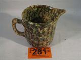 Vintage Spongeware / Yellowware Glass Pitcher
A vintage small beverage pitcher appears to be yellow-ware and has a nice spongeware pattern in green, brown and yellow shades. Measures 5.5" tall with a 5.5" diameter.
Z14