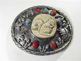 Jewelry Sterling Silver Belt Buckle
A great southwestern style sterling silver belt buckle featuring a white stone middle with a carved squirrel design. Raised design oak leaves and acorns surround the squirrel. Red coral and turquoise stones accents add a nice finish to the piece. Back of buckle is embossed "ATCO Sterling". Measures 3.5" across.
Total weight: 3.53 ozt.
ZB152