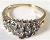 Jewelry 14kt Yellow Gold Diamond Fashion Ring
Lovely 14kt yellow gold ring featuring several prong set round brilliant cut diamond stones. Marked "14kp", ring size: 8. Total weight: 1.9 dwt. 
#2448-9171