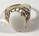 Jewelry 10kt Yellow Gold Opal Solitaire Ring
Gorgeous 10kt yellow gold ring featuring a large oval shaped, prong set opal stone with lovely coloring. Band has filigree style cut out designs. Consignor states the opal is 3.30 carats. Marked "10k", ring size: 8. Total weight: 2.4 dwt. 
ZB1341