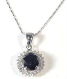 Jewelry 14K White Gold Black Diamond Necklace GLA
Magnificent 14K white gold necklace with a black diamond pendant. Included Gemological Laboratory of America (GLA) Premium Appraisal reads: 
"One lady's polished, stamped and electronically tested solid 14K white gold pendant mounted with: 1 Genuine Rounded Black Diamond and 44 Genuine Round Full Diamonds. This item weighs 8.80 grams and measures 28.64mm in length and 17.55mm in width, tapering to 4.04mm and includes a chain which measures 18.00 inches in length and 1.07mm in width. The chain has been finished with a lobster-claw closure. This pendant and chain combined weighs 8.80 grams. The condition is BRAND NEW. The gemstones have been analyzed in the mounting.
MAIN GEMSTONE
Identity: Genuine Black Diamond 
Cut: Round (Faceted)
Measurements: 10.68 - 10.60 x 7.67 mm (Range)
Quantity: 1
Carat Weight: 5.92cts. (est.)
Clarity Grade: Opaque
Color Grade: Black
Cut Grade: 5 - Good
ADJACENT GEMSTONE
Identity: Genuine Diamond
Cut: Round Full