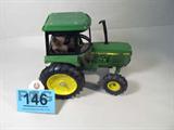 Farm Toy ERTL "John Deere 2550" Die Cast 1983
Awesome authentically scaled die cast model / replica ERTL "John Deere 2550" model tractor, from the collectors series dated November 1983. Partially enclosed cab, wide set front wheels, rubber-like wheels, a rear hitch, classic John Deere green & yellow coloration. Appears to be in great condition, consignor states this item was previously displayed in a non smoking pet free home. 
ZB2594