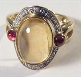 Jewelry 14kt Yellow Fashion Ring
Gorgeous 14kt yellow gold fashion ring featuring an oval shaped yellow colored stone, accented with 2 brown colored stones and small diamonds. Marked "14k", ring size: 7.5. Total weight: 3.1 dwt. 
#2448-9251