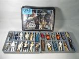 Star Wars Mini Action Figure Collectors Case 1977
A long time ago in a galaxy far, far away...This lot is the perfect item for any Star Wars collector or enthusiast! A vintage Star Wars mini action figure collectors case with 2 trays of twelve slots, holding 24 mini action figures from the epic Star Wars series. Dated 1977, some action figures included in this set are Han Solo, Chewie Chewbaca, R2D2, C3P0, storm troopers, alien figures and more! Action figures vary in size and shape, carrying case shows signs of wear and age, the vinyl is torn in a few places. Carrying case measures 12" long, 9" tall and 3" deep. Made by Kenner.
ZB4623