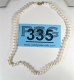 Jewelry Hand Knotted Pearl Necklace w/ 14kt Clasp
Gorgeous elegant hand knotted pearl necklace completed by lovely 14kt yellow gold clasp. Marked "14k", measures: 17.75" long