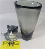 Lot of 2 Holmgaard Crystal Vase & Goebel Cat
This lot includes the following vintage items:
- A beautiful smoke glass crystal vase made by Danish manufacturer, Holmgaard. Vase is signed and numbered. Measures approximately 7" tall.
- An adorable porcelain gray and white cat made by Goebel, W. Germany. Measures 3.25" tall. Bottom is marked "80 610 15".
Z14