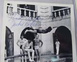 Jackie Robinson Autographed Snapshot AAU
A 4"x5" black and white photograph which has been autographed, "Best Wishes, Jackie Robinson". The back of the snapshot has a hand written note which reads, "Cookie Lavagetto diving in pool at Hotel Naumal, Havana, Cuba - 1947". Handwritten signature is certified by Authentic Autographs Unlimited, Serial #F10780. The Certificate of Authenticity is signed by Drew V. Max, a Court Qualified and Board Certified Forensic Document Examiner and handwriting expert who specializes in celebrities, sports, and antiquities. You may have seen Mr. Max on the reality television show "Pawn Stars".
From the internet: "Jack Roosevelt "Jackie" Robinson (January 31, 1919 – October 24, 1972) was an American baseball player who became the first black Major League Baseball (MLB) player of the modern era. Robinson broke the baseball color line when he debuted with the Brooklyn Dodgers in 1947. As the first black man to play in the major leagues since the 1880s, he was 