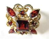Jewelry 10kt Yellow Gold Garnet Fashion Ring
Elegant 10kt yellow gold fashion ring featuring several red colored, prong set, Garnet stones. Consignor states: Garnet Mozambique. Marked "10k", ring size: 7.5. Total weight: 3.0 dwt. 
ZB1341