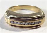 Jewelry 14kt Yellow Gold Diamond Band / Ring
Stately 14kt yellow gold wedding band featuring several small round diamond stones in channel style setting. Ring has cut out designs on either side of stones. Marked "14k", ring size: 5. Total weight: 3.6 dwt.
ZB4408