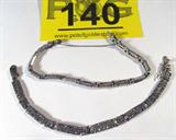 Jewelry 2 Sterling Silver & Marcasite Bracelets
Lot of 2 fabulous sterling silver bracelets featuring several small chrome colored stones, possibly Marcasite. Panel style link bracelet, each with a box / tab insert clasp, one comes with a safety chain. Both are marked / signed "925". Both measure approximately 7.5" long (estimate)
Total weight: .78 ozt
ZB2447-9081-CFSG52300