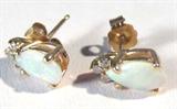 Jewelry 14kt Yellow Gold Opal Stud Earrings
Fabulous 14kt yellow gold stud earrings featuring pear shaped opal stones and small round diamond stones. Marked "14k", total weight: .9 dwt.
To complete your set see lot: 391.

#2448-9041
