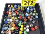 Large Lot of Vintage Marbles Cat's Eye Steely More
A large lot of vintage marbles in various colors, patterns and sizes including different shades of red, blue, green and orange. There are cat's eyes, clear and steel marbles, swirled patterns and solid colored marbles.
ZB4623