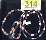 Jewelry Lot of 2 Amethyst Pearl Ladies Necklaces
Lot of 2 fabulous ladies jewelry pieces including:
- Gorgeous necklace featuring amethyst, quartz & rose quarts stones, faceted, arranged in a single strand with a 14K yellow gold clasp (marked / signed "14K"). Consignor states all stones are genuine. Measures 18" long.
- Wonderful single strand necklace featuring pink flat baroque pearls, faceted dark amethyst stones & small pink topaz stones, terminating with a 14K yellow gold clasp (marked / signed "14K"). Consignor states all stones are genuine. Measures 23.5" long.
ZB989