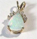 Jewelry 14kt Yellow Gold Opal & Diamond Pendant
Gorgeous 14kt yellow gold pendant with pear shaped opal stone accented with small round diamonds. Marked "14k", measures: .5" long. Total weight: .6 dwt.
 
To complete your set see lot: 217.
#2448-9031