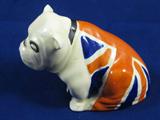 Royal Doulton Union Jack British Bulldog Figurine
A fantastic Union Jack British Bulldog figurine made by Royal Doulton in England. Bottom of figurine has the Royal Doulton hallmark and R&N 645658 stamped on it. Measures 2.25" tall x 4" long.