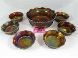 Lot of 7 Northwood Carnival Glass Salad Bowl Set
A gorgeous set of iridescent carnival glass made by Northwood featuring a grapevine pattern which includes a large salad bowl and 6 serving bowls. Salad bowl measures 3.5" tall with a 9" diameter. Each serving bowl measures 2" tall with a 5" diameter. No chips, cracks or breaks.
ZB5022