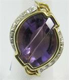 Jewelry 14kt Yellow Gold Amethyst & Diamond Ring
Stunning 14kt yellow gold cocktail ring featuring a large purple laser cut amethyst stone. Ring is also accented with small round diamonds. Marked "585", ring size: 6.25. Total weight: 6.3 dwt, 
ZB4858
