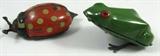 Lot of 2 Tin Mechanical Windup Toy Frog & Ladybug
This lot contains two vintage tin windup toys:
- A red and black ladybug, marked "GAMA D.R.G.M.", key is not included. Working condition unknown. Measures 3.25" long.
- A green hopping frog with red and black eyes, key is not included. Working condition unknown. Measures 3" long. No manufacturer markings.
ZB4623