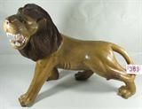 Art Hand Crafted Wood Carving Lion
A large lion sculpture which has been carved from a single piece of wood. Beautifully detailed mane and facial features. The piece is not signed nor dated. Measures 20" tall x 28" long.
Z14