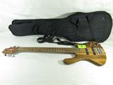 Washburn Taurus T25 5 String Bass Guitar +Case
Fantastic Washburn Taurus series T25 5 string bass guitar. According to the Washburn website: "These basses are pro level in every way, from the fine woods & finishes to the high quality components. You'll be stunned by what you can do on these instruments. Available in a variety of finishes & woods. The T24 won a Bass Player Magazine Editor's Choice award for outstanding construction. The T25 is a 5 string version of the T24."
This particular guitar features a contrast of dark and light woods, matte / satin finish on the body with a glossy finish on the neck, inlaid fret markers every 2 frets, silver tone metal tuning knob, volume & tone adjusters and bridge. Also has two strap pegs installed. Electric, input jack located at the bottom of the body. Appears to be in great shape, a few minor blemishes at the bottom of the body from use. Measures 44" long. This guitar comes with a black soft / canvas case.
Tag word: Instrument
ZB152
