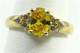 Jewelry 14KT Gemesis Yellow Gold Diamond Ring*
Gorgeous 14KT yellow gold fashion ring featuring a striking, oval cut, prong set, yellow colored diamond accented with three small, round cut, diamonds. Marked "14KT", ring size: 6.5. Total weight: 2.3 dwt.
*Reserve Item
ZB4858