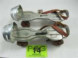 Antique Metal Roller Skates "Globe Skate" No. 30
Wonderful pair of antique metal roller skates, designed to strap on over the shoe. Marked / stamped "No. 30 Globe Skate Corp. Wheels are showing signs of rust, straps are worn down from heavy use. Measure 9.25" long. Skates come with a key of some sort, unknown purpose / use.
Z14