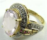 Jewelry 14K Yellow Gold Pink & White Gemstone Ring
Fabulous 14K yellow gold ladies' fashion / cocktail ring. Features a large oval faceted pale pink stone, possibly Morganite / Beryl, in a four prong setting, surrounded by white gemstones, possibly diamond, with 6 small red stones, possibly ruby. A fabulous design, marked / signed "14K" with a second undetermined signature. Fits a finger size 7.0.
Total weight: 4.4 dwt
ZB1341