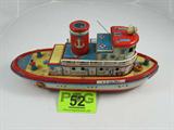 Vintage Modern Toys Tin Litho Tugboat
A vintage tin litho toy tugboat made by Modern Toys in Japan. Shows signs of wear from age and use. Measures 14.5" long.
ZB4623