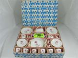 Children's 25 PC Tea Set Six Place Setting "Japan"
Adorable 25 piece child's tea set, with enough pieces for six place settings. Includes plates, saucers, a tea kettle / pot, cream and sugar holders, tea cups and more. Ceramic plates marked / stamped "Japan". The pattern is a beautiful pink rose with brown and silver tone leaves, and gold tone enameling throughout. Simply darling. Pieces appear to be in good condition and in the original container. Box shows some signs of wear and age, but is intact.
Tag word: China, Porcelain
ZB5104