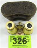 Antique Verres Superieures Ivory Opera Binoculars
Gorgeous pair of opera glasses / binoculars, marked / stamped "Verres Superieures". Brass & silver tone with possible ivory covering the majority of the binoculars. The ivory-like material has several cracks around the base and eye pieces, adding to it's antique charm. Possibly Victorian style. Comes in an antique leather-like material case. Binoculars measure 3.5"wide x 2.5"deep.
ZB152