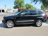 2005 Jeep Grand Cherokee Limited 4WD*
Exterior: Brilliant Black Crystal
Interior: Khaki / Graystone; Leather
Engine: 5.7L Hemi V8
Transmission: 5-Speed Automatic
Mileage: Approximately 74,000 miles
One owner, non-smoking vehicle. All maintenance has been kept up and professionally done. The Jeep is in good condition and runs great. Tires are in good condition. Consigner states that there have been no major problems with the vehicle. Seats up to 5 passengers.

Features:
Air Bags
Tire Pressure Monitoring System
4-Wheel Traction Control
Anti-Lock Brakes
Rain-Sensitive Wipers
Power Locks & Windows
Keyless Entry w/ Alarm
AM/FM Stereo w/In-Dash 6-Disc CD/MP3 Player
SIRUS Satellite Radio Capable
Boston Acoustics Premium Sound System
Steering Wheel Mounted Audio Controls
Memory Controls for Drivers Seat, Mirrors, Radio, Pedals
Power Sunroof
Heated Front Seats
Park Sense-Rear Back-up System
Tow Package
Trail Rated
Many Others
*Reserve Item
ZB3803

Tag Word: Car SUV Truck