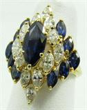 Jewelry 18kt Yellow Gold Diamond & Sapphire Ring*
Exquisite 18kt yellow gold cocktail ring featuring marquis shaped, prong set, blue sapphires and diamonds. Consignor states the approximate total carat weight of the stones are: Sapphires: 4 ctw, diamonds: 2.5 ctw. Ring is marked "18k", size: 5.75. Total weight: 4.4 dwt.
*Reserve Item