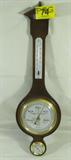 Vintage Decorative 3-Part Tradition Wall Barometer
Wooden fiddle / banjo shaped wall barometer, thermometer and hygrometer, originally sold by Sears & Roebuck Company. The barometer is stamped "Tradition - Made in Japan". Measures 29" long x 9" across.