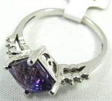 Jewelry 14KT White Gold Amethyst/ Diamond Ring
Beautiful 14KT white gold fashion ring featuring a square cut, prong set, purple, faceted, Amethyst stone decorated with six, small, round cut diamonds. Ring size: 6.5, total weight: 1.6 dwt.