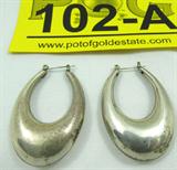Jewelry Sterling Silver Hoop Earrings
Lovely sterling silver fashion earrings with oval shaped design. Unknown marking, consignor states these are sterling. Measures: 1.75" long, total weight: .25 ozt.