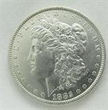 1882-O/S Morgan Silver Dollar. 26.73g of 90% Silver. Rare Variety. Graded by the consignor as Choice Brilliant Uncirculated. No Sales Tax on Coins, Currency, or Bullion.