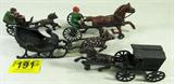 Lot of 4 Cast Iron Horse Drawn Carriage Toys
Lot of 4 cast iron model / replica horse drawn carriages. Each is being drawn by a single horse, black & green & brown colors present. One of the figures appears to be a sleigh being pulled by a white spotted reindeer. Each figurine appears to be in good condition, possibly reproductions.