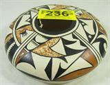 Vintage Hopi Indian Pottery Bowl Signed "AY"
A fantastic Hopi Indian hand crafted pottery bowl. Bottom is signed "AY - Hopi - '79". Measures 3.5" tall x 10" in diameter.