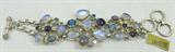 Jewelry Sterling Multicolored Stone Link Bracelet
Gorgeous sterling silver link bracelet featuring multicolored gemstones, including: Moonstones, amethysts, iolite, and Blue Topaz. Bracelet is completed by a ring and bar style clasp. Adjustable length measures: 7", 7.5", or 8" long, marked "925". Total weight: 1.69 ozt.