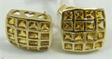 Jewelry 14KT Yellow Gold Citrine Earrings
Beautiful 14KT yellow gold fashion pierced earrings featuring square cut citrine stones in channel setting. Marked "14KT". Total weight: 2.9 dwt.