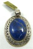 Jewelry Sterling Silver Lapis Lazuli Pendant
Gorgeous large sterling silver oval shaped pendant with large, blue colored, cabochon Lapis Lazuli stone. Marked "925", measures: 2.5" long. Total weight: .76 ozt.