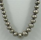 Jewelry Sterling Silver Bead Necklace
A lovely sterling silver beaded necklace. Beads graduate in size and ends in with a hook and clasp closure.
Total weight: 1.56 ozt