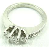 Jewelry 14kt White Gold Tiered Diamond Ring
Gorgeous 14kt white gold engagement ring with tiered design featuring prong set, princess cut diamonds. Band of ring has six small round diamonds. Marked "14k", ring size: 7. Total weight: 3.3 dwt.