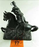 Bronze Horse & Rider Sculpture / Statue
A wonderful non-metallic sculpture, appears to be bronze, which features a majestic horse and rider wearing three musketeer like clothing. The rider has a wire lasso in his right hand and a rifle strapped to his back. The piece is not signed. Measures 9.75" tall x 9.5" wide x 3.25" in depth.