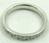 Jewelry 14kt White Gold Diamond Eternity Band
Gorgeous 14kt white gold eternity style band featuring several diamonds. Included Labtrade Gemological Laboratory report reads: "One stamped 14kt white gold lady's eternity ring. Containing: Forty-Six pave' set round brilliant cut diamonds approximate total weight of 0.50cts. Clarity SI-1 to I-1 Color G-H. Total weight of ring 3.20 gm". Ring size: 6.75, marked "14k". Total weight: 2.0 dwt.