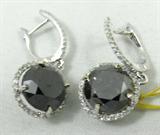 Jewelry 18KT White Gold Black Diamond Earrings
Elegant 18K white gold black & white diamond dangle earring. Included American International Gemologists (AIG) Gemological Report reads:
One pair of electronically tested 18KT white gold ladies cast & assembled black and white dangle earrings with hinged, snap locking posts. Condition is new, good workmanship. Bright polish finish. Trademark is HANA. Identified with markings of "18K". Containing: Two prong set round brilliant cut diamonds, measuring 8.90- 8.80 x 6.38mm (depth est.) approximate total weight of 2 stones= 7.58ct. Indications of multiple laboratory enhancements. Graded in the setting.
Clarity: Declasse
Color: Fancy Black; Irradiated.
Eighty prong set round brilliant cut diamonds, measuring 1.00 - 1.00 x 0.60mm (depth est.) approximate total weight of 80 stones =0.31ct. Graded in the setting.
Clarity: I-1 to I-2
Color: G-1
Total weight of Diamonds: 7.89ct.
Total weight of Earrings: 4.50gm."